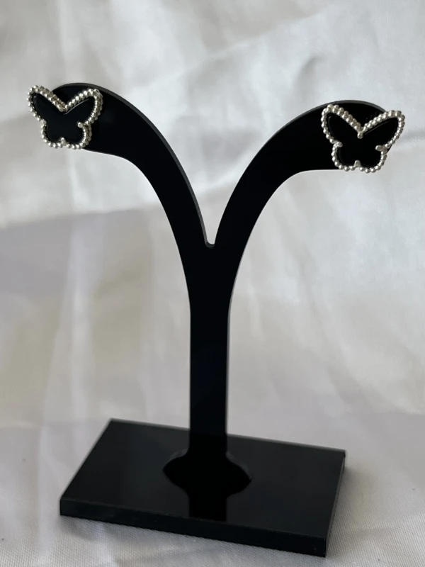 Aretes Van Cleef & Arpels Mariposas Ónix's foto | Sterlyn Jewels |  BizneCubano
